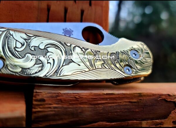 il_fullxfull.3680570884_i9zo.jpg Leaf Scroll - Spyderco PM2 Lotus - NEW Relief Engraving Style - Deep Laser Engraved - Brass Knife Scales -Flytanium *Knife Install Optional*