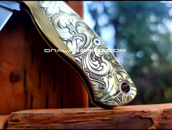 il_fullxfull.3728171151_yo4e.jpg Leaf Scroll - Spyderco PM2 Lotus - NEW Relief Engraving Style - Deep Laser Engraved - Brass Knife Scales -Flytanium *Knife Install Optional*