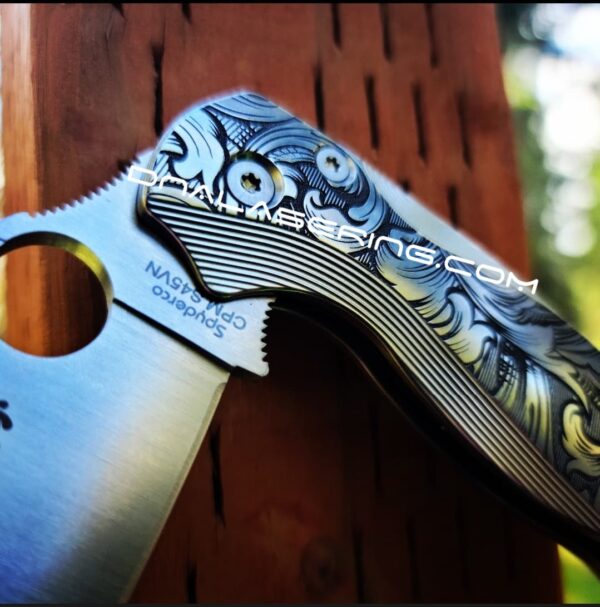 il_fullxfull.3879352570_nn75.jpg Leaf Scroll - Spyderco PM2 Lotus TI - NEW Relief Engraving - Deep Laser Engraved - Titanium Scales - Flytanium Gear *Knife Install Optional*