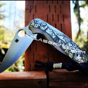il_fullxfull.3926839911_rfwq.jpg Leaf Scroll - Spyderco PM2 Lotus TI - NEW Relief Engraving - Deep Laser Engraved - Titanium Scales - Flytanium Gear *Knife Install Optional*