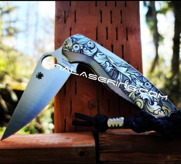 il_fullxfull.3926839911_rfwq.jpg Leaf Scroll - Spyderco PM2 Lotus TI - NEW Relief Engraving - Deep Laser Engraved - Titanium Scales - Flytanium Gear *Knife Install Optional*