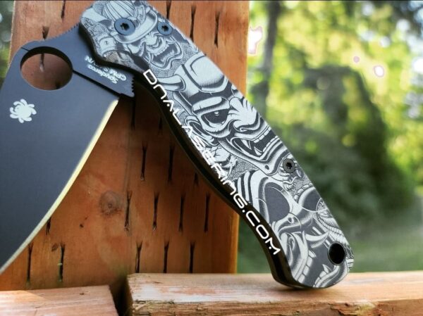 il_fullxfull.4085326865_ttae-1.jpg Spyderco PM2 TI - Triple Masks of the Samurai - Deep Engraved Titanium PM2 Knife Scales - EDC Gear - Knife & Hardware Optional