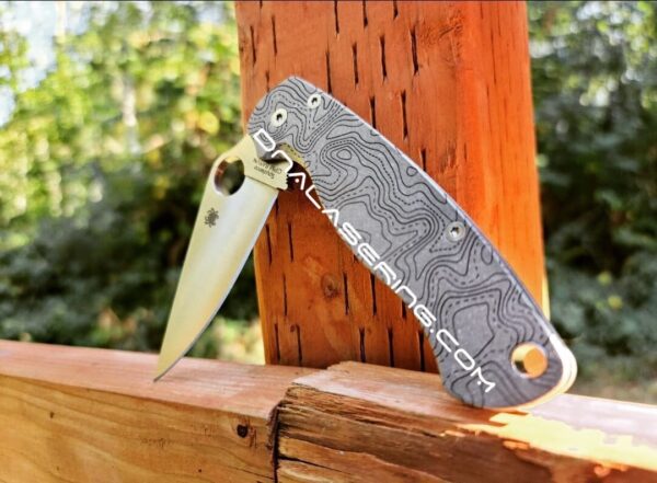 il_fullxfull.4231560012_8ye3-1-1.jpg Topographic Map - Spyderco PM2 TI - Fiber Laser Deep Engraved - Titanium Knife Scales - Flytanium Gear - Knife & Hardware Optional