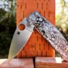 il_fullxfull.4253128484_bsjb.jpg Japanese Warrior - Samurai Skulls - Spyderco Manix 2 - Deep Laser Engraved Titanium Scales - Flytanium Gear *Knife Install Optional*
