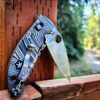 il_fullxfull.4262571401_beh0-1.jpg Beskar Ingot - Spyderco Manix 2 - Deep Laser Engraved - Antique Stonewash Flytanium Titanium Scales - EDC gear *Knife Install Optional*