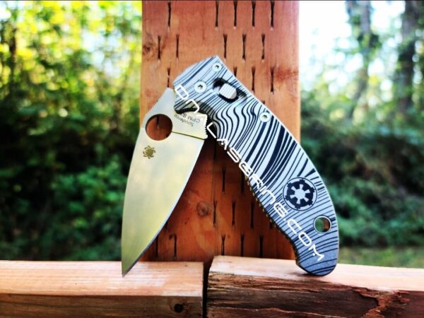 il_fullxfull.4262571507_mwph-1.jpg Beskar Ingot - Spyderco Manix 2 - Deep Laser Engraved - Antique Stonewash Flytanium Titanium Scales - EDC gear *Knife Install Optional*