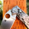 il_fullxfull.4300517275_rvzx.jpg Japanese Warrior - Samurai Skulls - Spyderco Manix 2 - Deep Laser Engraved Titanium Scales - Flytanium Gear *Knife Install Optional*