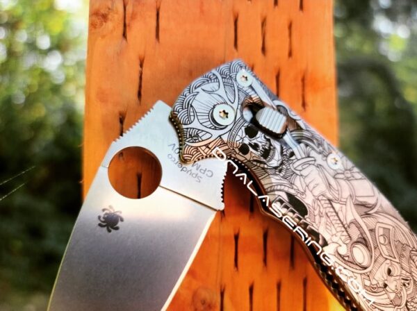 il_fullxfull.4300517275_rvzx.jpg Japanese Warrior - Samurai Skulls - Spyderco Manix 2 - Deep Laser Engraved Titanium Scales - Flytanium Gear *Knife Install Optional*