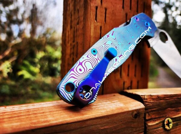il_fullxfull.4655069198_idm9-1.jpg Damascus Pattern - Spyderco PM2 TI - Fiber Laser Deep Engraved - Anodized Titanium Knife Scales - Flytanium - Knife & Hardware Optional