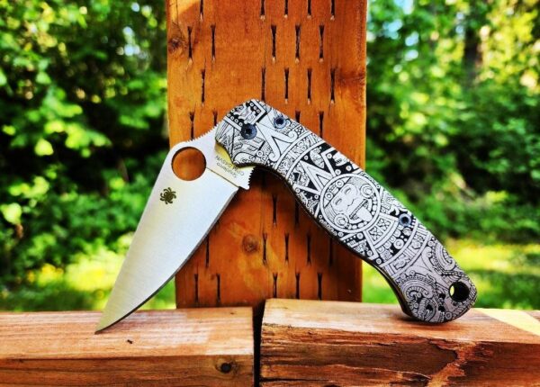 il_fullxfull.4956233198_p6oc-1.jpg Aztec design - Spyderco PM2 TI -Fiber Laser Deep Engraved - Titanium Knife Scales - Flytanium Gear - Knife & Hardware Optional