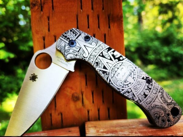 il_fullxfull.4956233532_qvpm-1.jpg Aztec design - Spyderco PM2 TI -Fiber Laser Deep Engraved - Titanium Knife Scales - Flytanium Gear - Knife & Hardware Optional