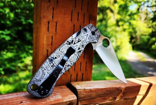 il_fullxfull.5004496881_hprv-1.jpg Aztec design - Spyderco PM2 TI -Fiber Laser Deep Engraved - Titanium Knife Scales - Flytanium Gear - Knife & Hardware Optional