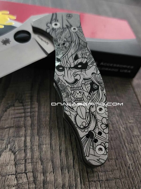 il_fullxfull.5177746880_ftd3-1.jpg Samurai Mask - Spyderco Yojimbo 2 - Deep Laser Engraved - Stonewash Titanium Scales - EDC Gear - Fully Installed Knife Option