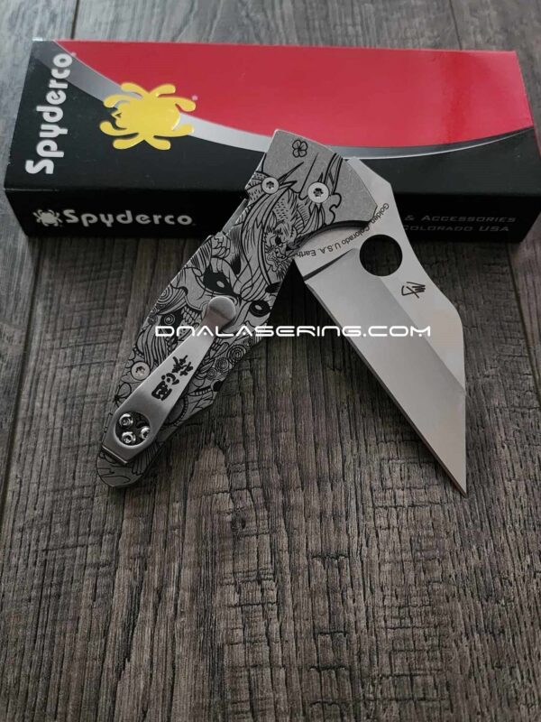 il_fullxfull.5225980181_awcx-1.jpg Samurai Mask - Spyderco Yojimbo 2 - Deep Laser Engraved - Stonewash Titanium Scales - EDC Gear - Fully Installed Knife Option