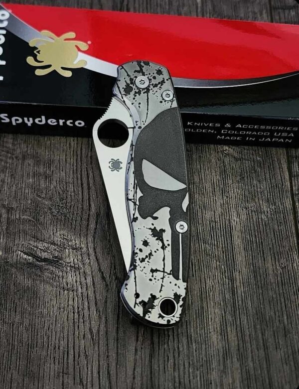 il_fullxfull.6096876594_r4k7.jpg Spyderco PM2 relief engraved titanium Punisher Skull Scales with matching relief engraved LynchNW deep carry pocket clip - Titanium hardware