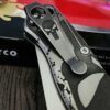 Spyderco PM2 relief engraved titanium Punisher Skull Scales with matching relief engraved LynchNW deep carry pocket clip - Titanium hardware
