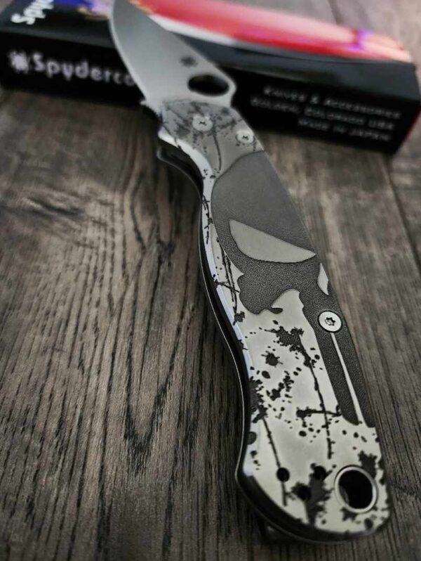 il_fullxfull.6144961591_iybu.jpg Spyderco PM2 relief engraved titanium Punisher Skull Scales with matching relief engraved LynchNW deep carry pocket clip - Titanium hardware
