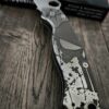 Spyderco PM2 relief engraved titanium Punisher Skull Scales with matching relief engraved LynchNW deep carry pocket clip - Titanium hardware