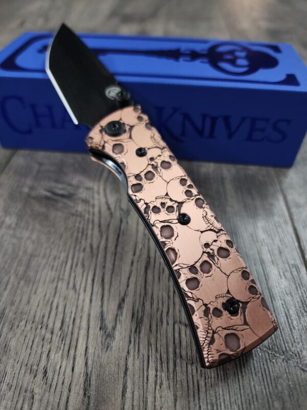 il_fullxfull.6626504464_m3qc.jpg Chaves Redencion Street - Skulls Relief Engraved Copper Scales - Complete Knife - Black Elmax Blade - New In Box