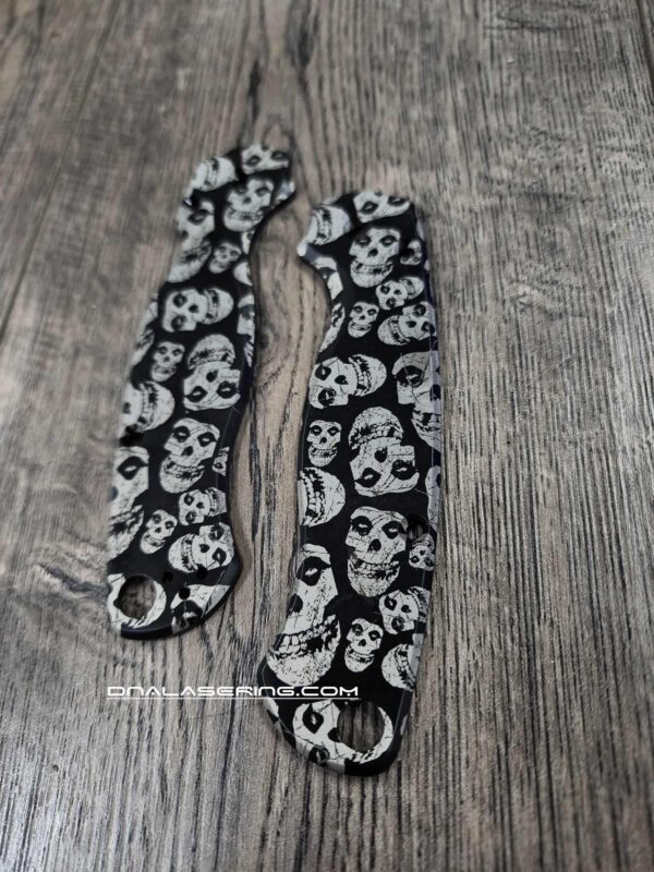 il_fullxfull.7010127175_20mr-1.jpg Misfits - Spyderco PM2 TI - Fiber Laser Engraved - Titanium Black Scales - Fiend Skulls - Flytanium Gear - Knife & Hardware Optional