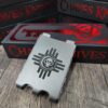 il_fullxfull.7195547122_tpaa.jpg Chaves Ultramar - Skull & Zia Sun - Fiber Laser Relief Engraved - TI Fold Wallet - EDC Gear - Titanium Wallet Cards Only