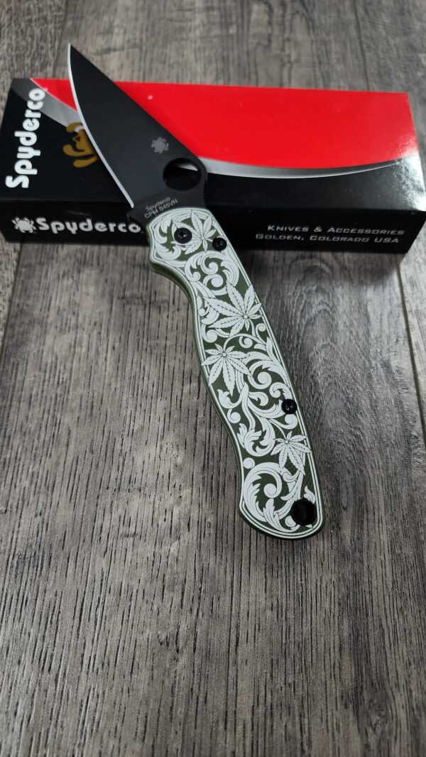 il_fullxfull.7924327174_a4ac-1-1.jpg Spyderco PM2 Loop Scales - Laser Engraved Cannabis Scroll Pattern - Aluminum Olive Drab Scales - Flytanium Gear - Knife & Hardware Optional