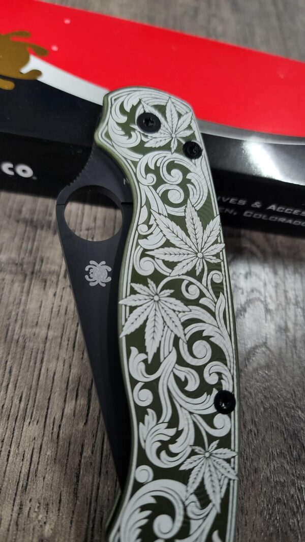 il_fullxfull.7972233103_rmmx-1-1.jpg Spyderco PM2 Loop Scales - Laser Engraved Cannabis Scroll Pattern - Aluminum Olive Drab Scales - Flytanium Gear - Knife & Hardware Optional