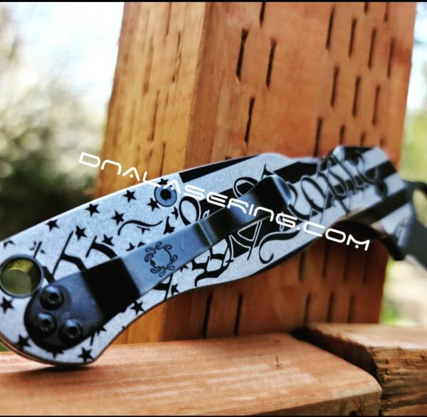 il_fullxfull.3910873671_4n16.jpg We the People - US Flag - Spyderco PM2 - Deep Laser Engraved - PM2 Titanium Knife Scales - Flytanium Gear - Knife & Hardware Optional