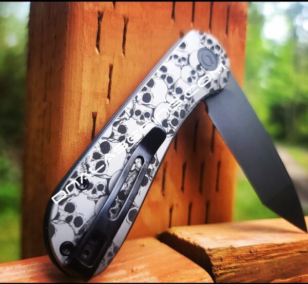 il_fullxfull.3914884643_bict.jpg Civivi Elementum - Skulls Pattern - Deep Laser Engraved Titanium Knife Scales - EDC Gear - Knife Install Optional