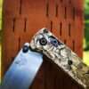 il_fullxfull.3939664419_7s8f.jpg Leaf Scroll - MINI Benchmade Bugout Brass - Deep Laser Engraved Brass Scales - Flytanium Gear *Scales / knife handles Only*