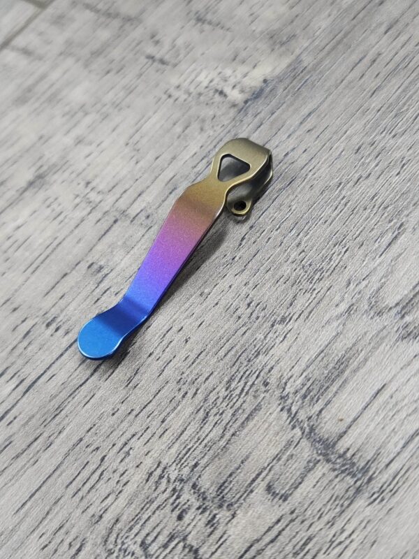 il_fullxfull.4643599022_g28l.jpg LynchNW Benchmade - Standard - Anodized Titanium - Deep Carry Pocket Clip - Ano Finish - Bronze - Blurple - Fade - Purple MADE In USA