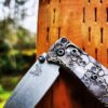 il_fullxfull.4846262389_64bi.jpg Skulls - Aged Finish - MINI Benchmade Bugout Brass - Relief Engraved Brass Scales - Flytanium Gear *Scales/Handles Only* Optional Coin
