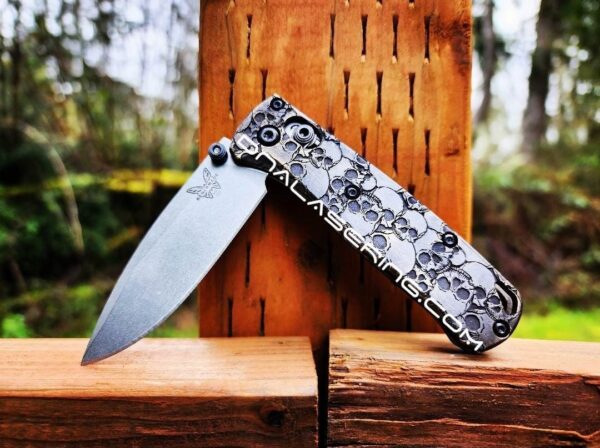 il_fullxfull.4846262395_tibb.jpg Skulls - Aged Finish - MINI Benchmade Bugout Brass - Relief Engraved Brass Scales - Flytanium Gear *Scales/Handles Only* Optional Coin