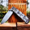 il_fullxfull.4846262397_bwht.jpg Skulls - Aged Finish - MINI Benchmade Bugout Brass - Relief Engraved Brass Scales - Flytanium Gear *Scales/Handles Only* Optional Coin