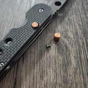 il_fullxfull.4955592773_n0ci.jpg Spyderco Smock - Replacement Button (Lock Release) - Copper - EDC Gear ( knife not included )