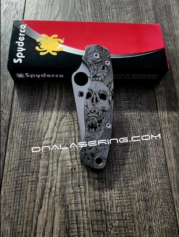 il_fullxfull.5167191314_hylc.jpg Fearless Tarantula Inside Skull - Spyderco PM2 - Engraved PM2 Titanium Knife Scales - Paramilitary 2 EDC - Knife & Hardware Optional