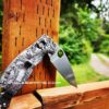 il_fullxfull.5700930170_dl9w.jpg Detailed Leaf Scroll - Spyderco Manix 2 - Deep Fiber Laser Engraved Titanium Scales - Flytanium Gear *Knife Install Optional*