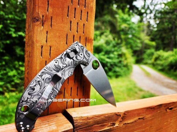 il_fullxfull.5700930170_dl9w.jpg Detailed Leaf Scroll - Spyderco Manix 2 - Deep Fiber Laser Engraved Titanium Scales - Flytanium Gear *Knife Install Optional*