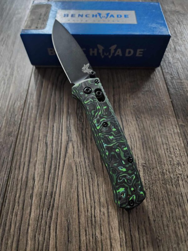 il_fullxfull.5721073021_1gg9.jpg Benchmade Bugout Electric Green Carbon Fiber Scales - No Lanyard - Deep Chamfer