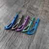 il_fullxfull.6685708482_clpu.jpg Benchmade Bugout 535 - Anodized Titanium Backspacer - 5 Color Options - Blue - Bronze - Purple - Green - Teal - Flytanium Gear