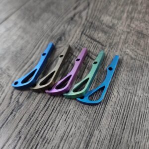il_fullxfull.6685708482_clpu.jpg Benchmade Bugout 535 - Anodized Titanium Backspacer - 5 Color Options - Blue - Bronze - Purple - Green - Teal - Flytanium Gear