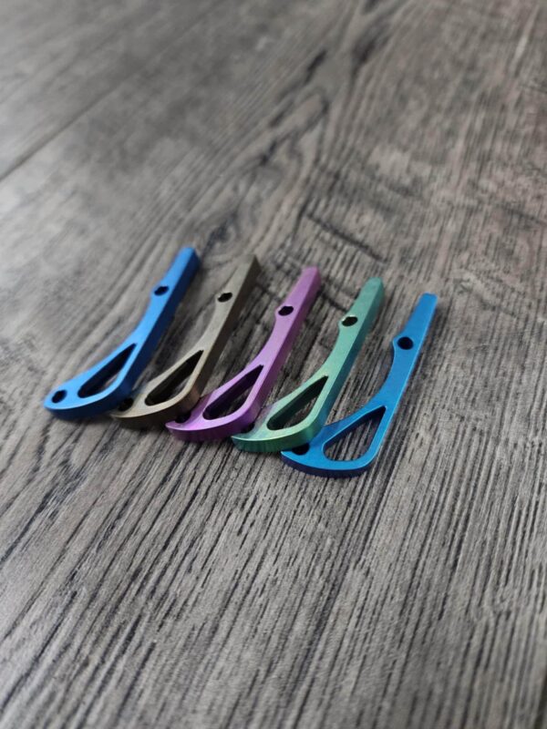 il_fullxfull.6685708482_clpu.jpg Benchmade Bugout 535 - Anodized Titanium Backspacer - 5 Color Options - Blue - Bronze - Purple - Green - Teal - Flytanium Gear