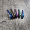 il_fullxfull.6733745863_nsvt.jpg Benchmade Bugout 535 - Anodized Titanium Backspacer - 5 Color Options - Blue - Bronze - Purple - Green - Teal - Flytanium Gear