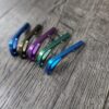 il_fullxfull.6733745871_qzm3.jpg Benchmade Bugout 535 - Anodized Titanium Backspacer - 5 Color Options - Blue - Bronze - Purple - Green - Teal - Flytanium Gear