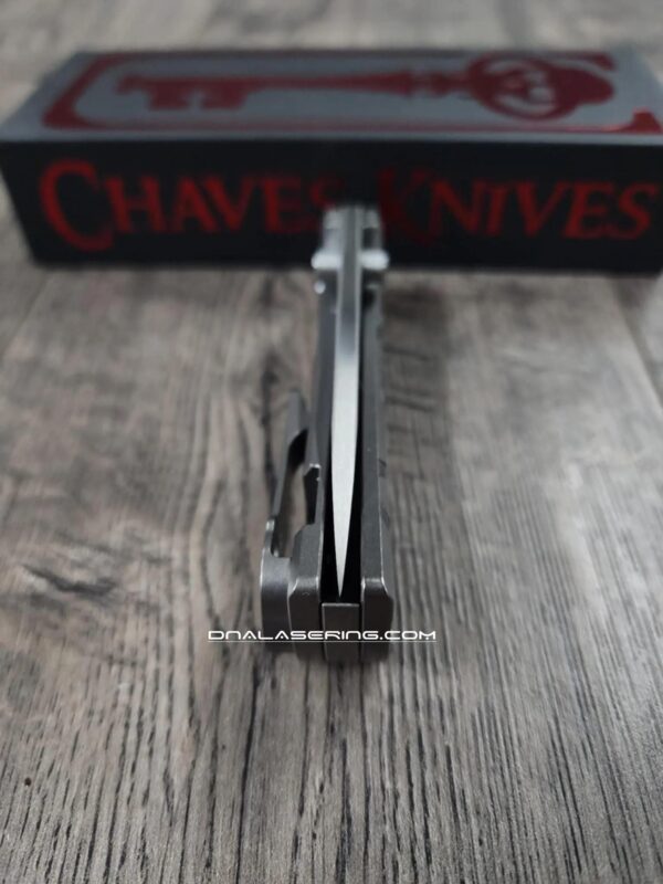 il_fullxfull.6951773770_lq70.jpg Chaves Knives - Relief Engraved RCK9 - Titanium Scales - Chaves Key Skull Theme - M390 Steel - COMPLETE KNIFE!! With Extra Clip - New in Box