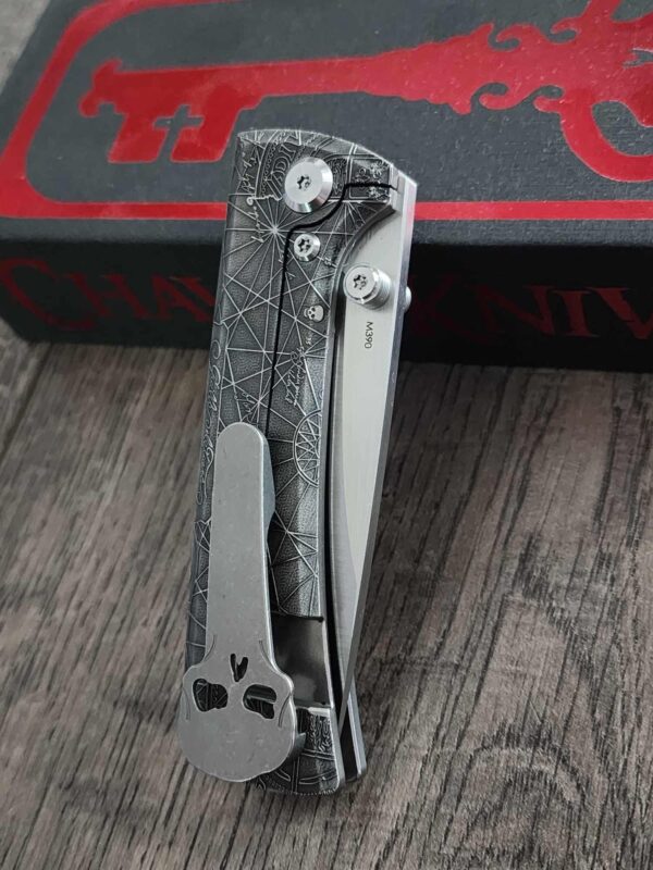 il_fullxfull.6974916230_d44q.jpg Chaves Knives - Relief Engraved RCK9 - Titanium Scales - GOONIES!! - M390 Steel - COMPLETE KNIFE!! With Extra Clip - New in Box