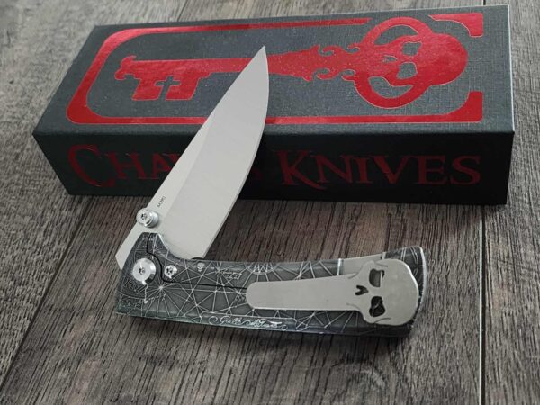 il_fullxfull.7022899611_9eg6.jpg Chaves Knives - Relief Engraved RCK9 - Titanium Scales - GOONIES!! - M390 Steel - COMPLETE KNIFE!! With Extra Clip - New in Box