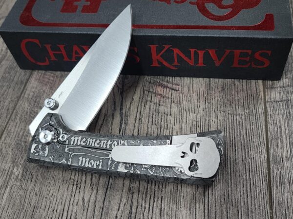il_fullxfull.7094632615_6hqb.jpg Chaves Knives - Relief Engraved RCK9 - Titanium Scales - Momento Mori - M390 Steel - COMPLETE KNIFE!! With Extra Clip - New in Box