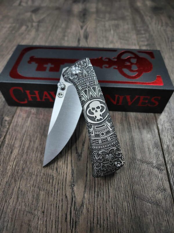 il_fullxfull.7216142650_qu1f.jpg Chaves Knives - Relief Engraved RCK9 - Titanium Scales - Chaves Skull Aztec - M390 Steel - COMPLETE KNIFE!! With Extra Clip - New in Box
