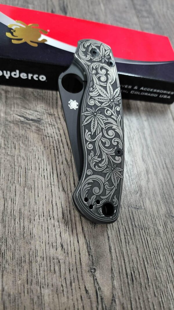 il_fullxfull.7973556348_oley.jpg Spyderco PM2 TI - Cannabis Leaf Scroll - Relief Engraved Titanium Knife Scales - EDC Gear - Knife & Hardware Optional